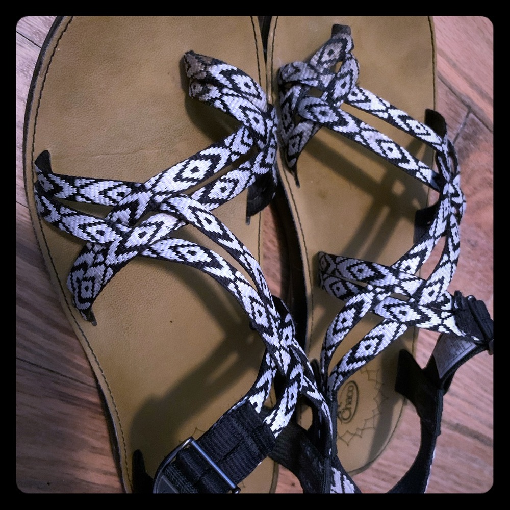 Black and white leather Chacos
